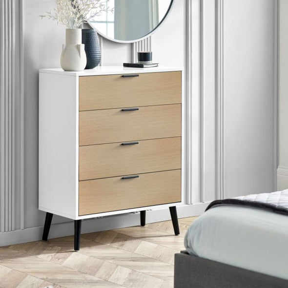 ALBA 4 Drawer Bedroom Chest in White & Oak Effect. A sleek and modern chest of drawers ideal for bedroom organization and storage. Tapered black legs.