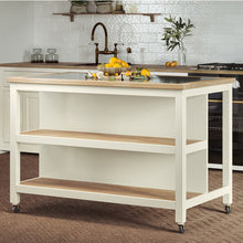 Discover the versatile Open Kitchen Island w/ Breakfast Bar in cream colour. Features black granite top, oak shelves, and braked wheels for easy mobility.