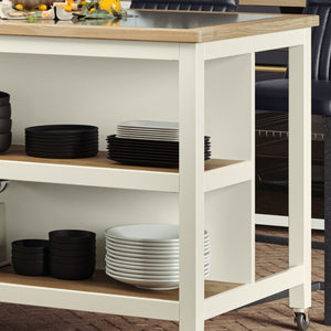 Discover the versatile Open Kitchen Island w/ Breakfast Bar in cream colour. Features black granite top, oak shelves, and braked wheels for easy mobility.