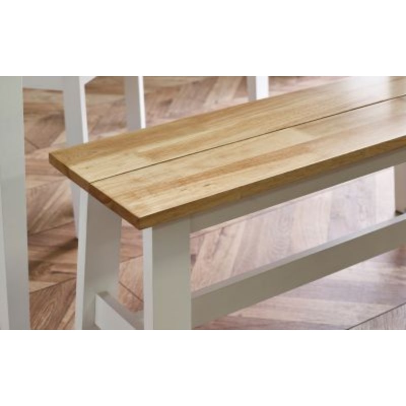 JULIAN BOWEN LINWOOD Small Dining Bench in white frame with natural oak effect seat. Compact and durable, ideal for kitchen or dining spaces.