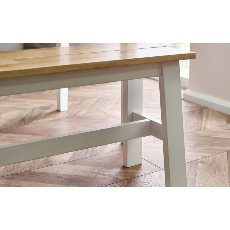 JULIAN BOWEN LINWOOD Small Dining Bench in white frame with natural oak effect seat. Compact and durable, ideal for kitchen or dining spaces.