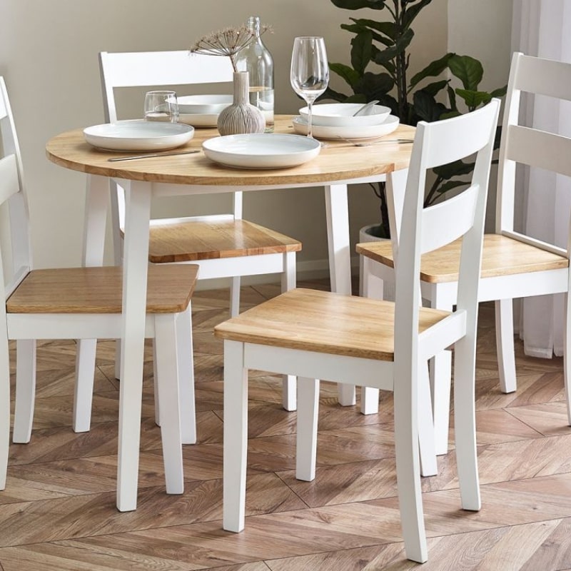 Discover the Small Round Dropleaf Table in White & Natural Oak Effect w/ extendable top in oak effect & white legs. Enhance your dining experience w/ versatile elegance.