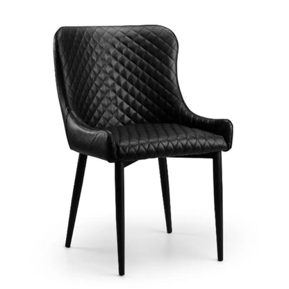 Single Luxe Faux Leather Dining Chair in black with diamond-quilted detailing and black legs, displayed on a white background.